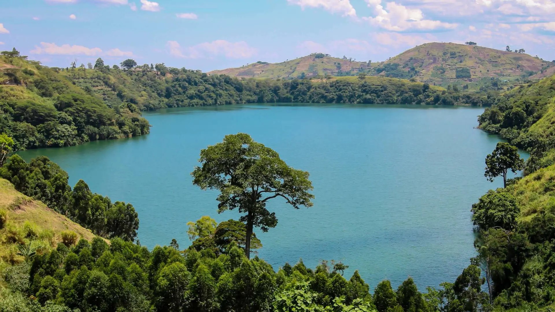 Take guided boat tours on the stunning crater lakes surrounding Fort Portal