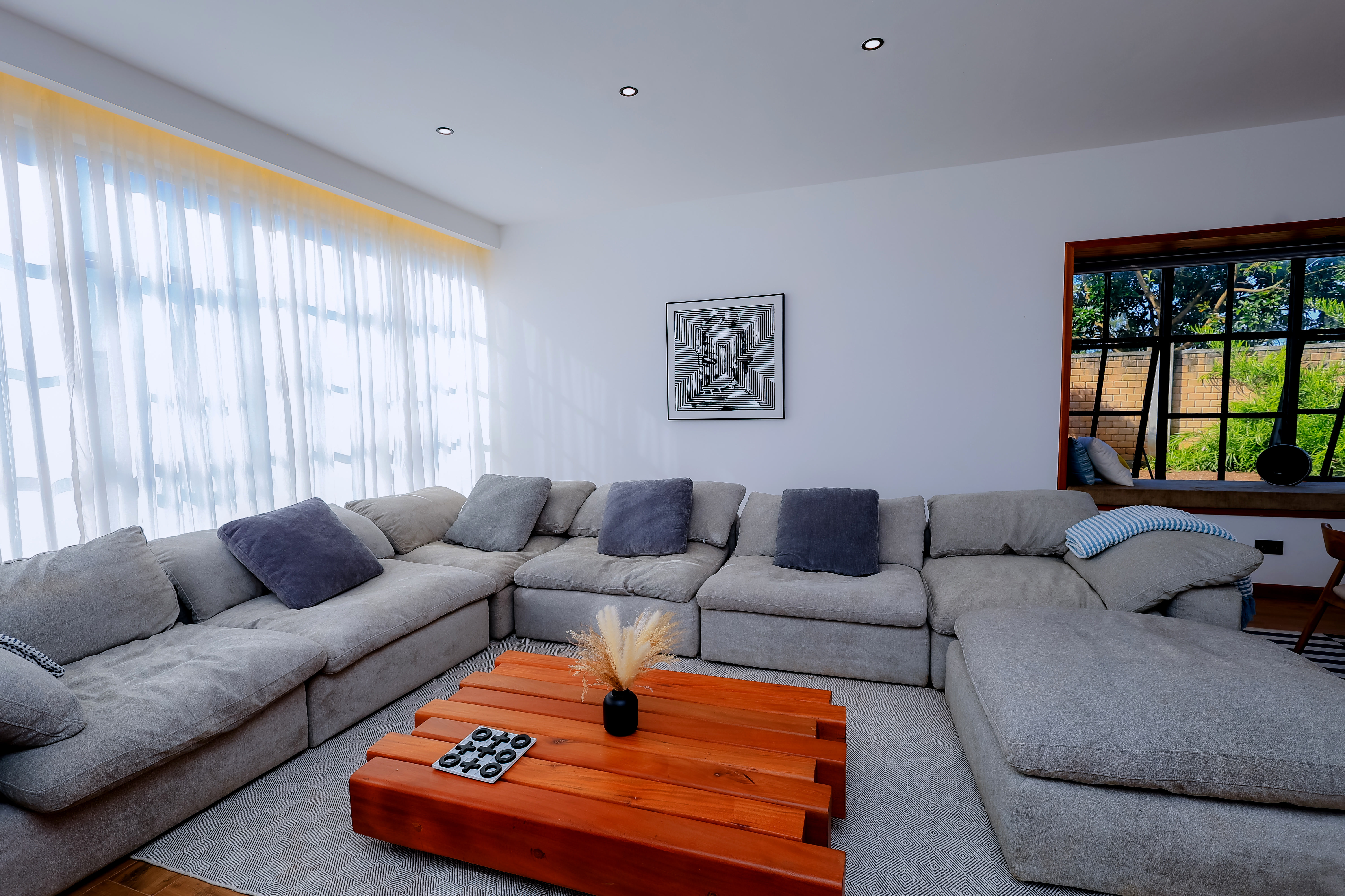 Elegant dining setup with natural lighting at Kokasemera Villa