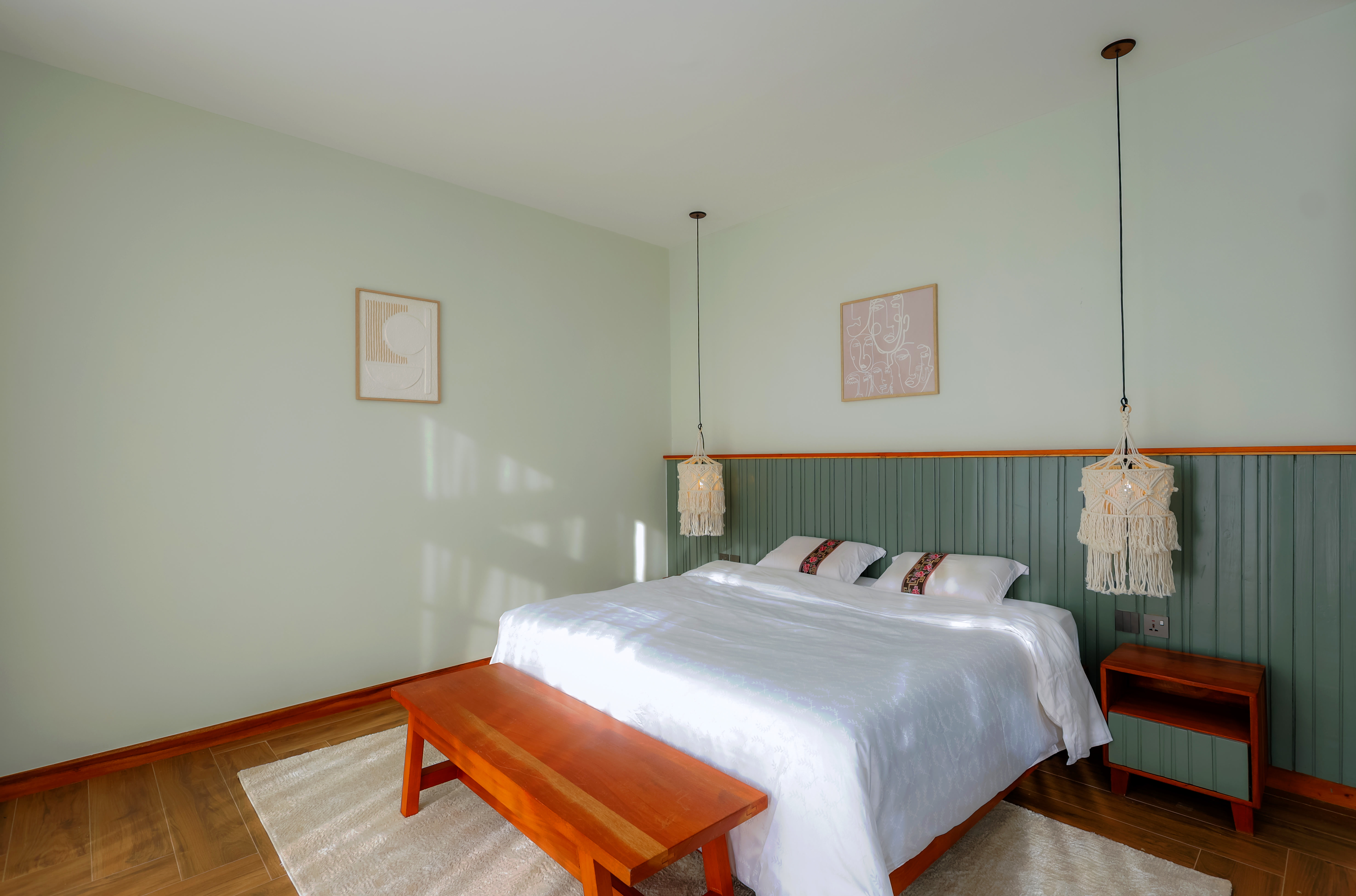 Standard bedroom featuring comfortable bedding and natural light